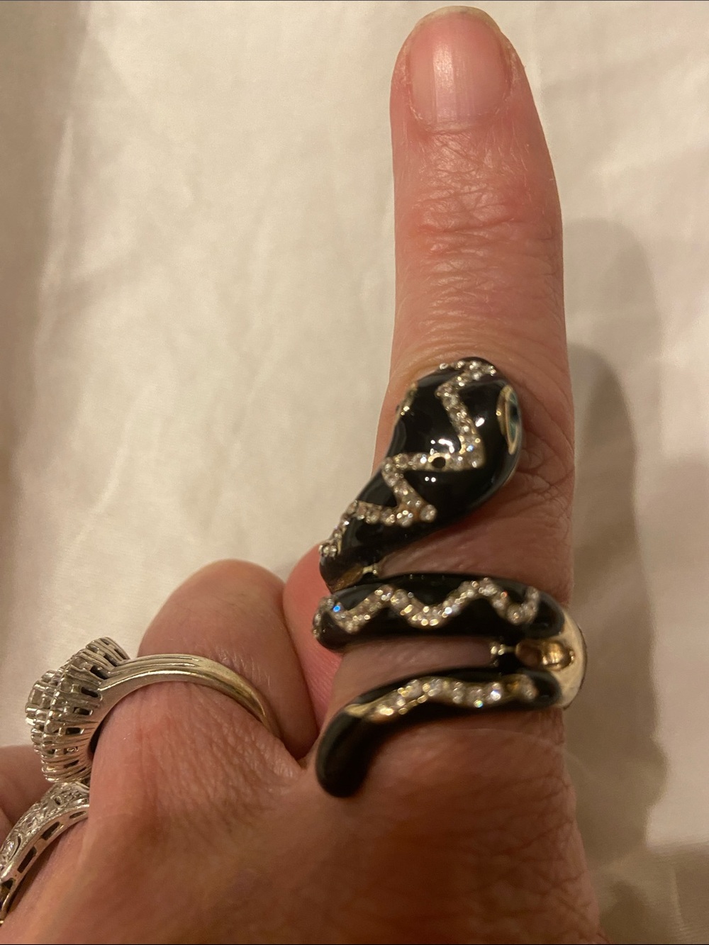 Black Enamel Snake Wrap Ring with Sparkling Accents and black gold earrings